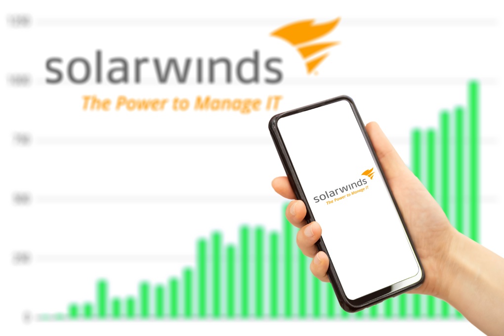 Solarwinds company. Solarwinds technology logo on smartphone screen in hand. Moscow, Russia - March 2, 2021.