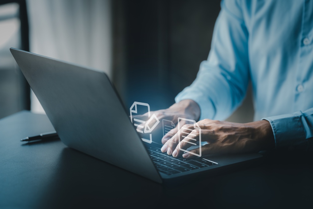 business man with holograms of digital document files, data files on computers stored as cloud databases can be viewed online and prevented data loss from the device. Data file management concept.